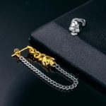 Two-tone Skull Asymmetric Earrings