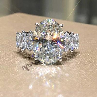 3.5 Ct Brilliant Oval Cut with Marquise Shape Side Stones Ring
