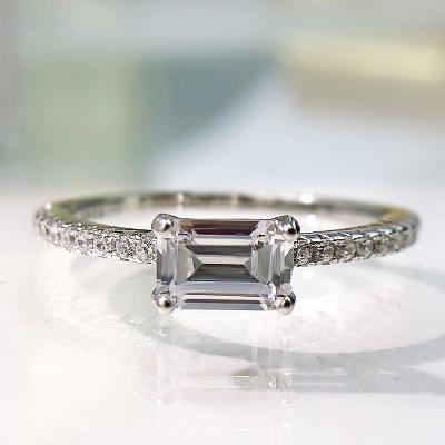 Emerald Cut White Stone and Halo Engagement Ring