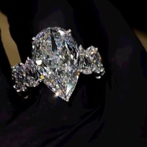 Captivating Pear Cut Eternity Engagement Ring in Sterling Silver