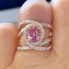 Glittering Waved Oval Cut Engagement Ring in 18K Rose Gold Plated