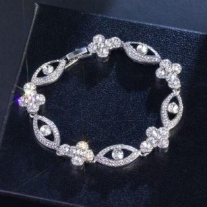 Round Diamonds Cross with Evil Eyes Bracelet in White Gold