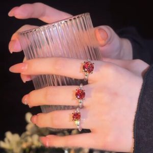 Elegant Round Cut Red Diamond Three Stone Engagement Ring