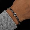 Iced Out Black Four Leaf Clover Tennis Bracelet in White Gold